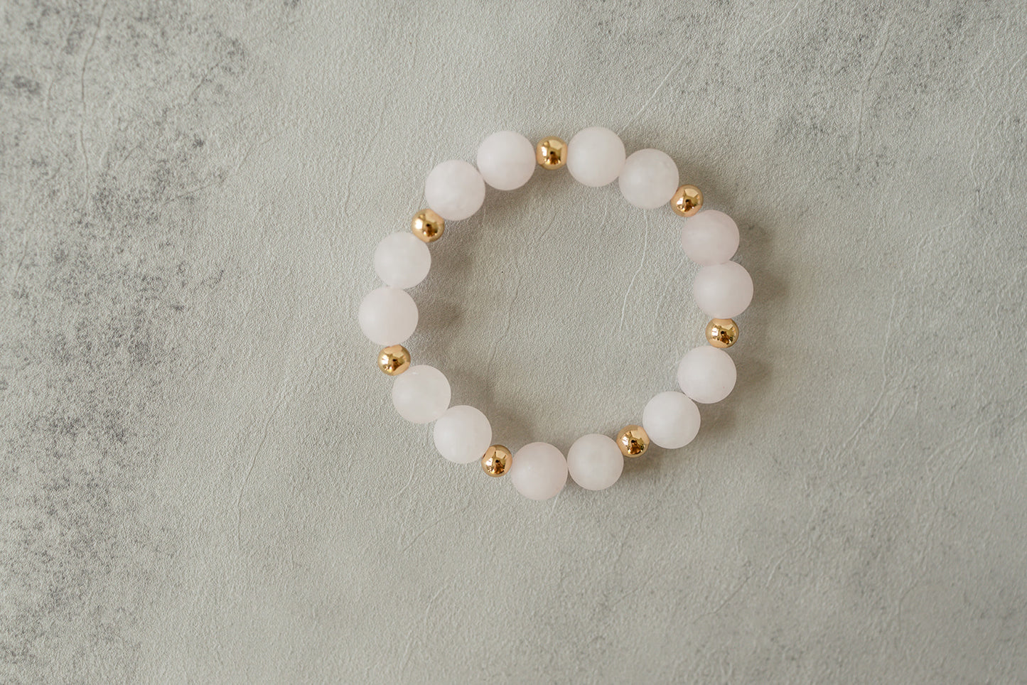 Quartz Blush Bracelet featuring rose quartz and gold beads
