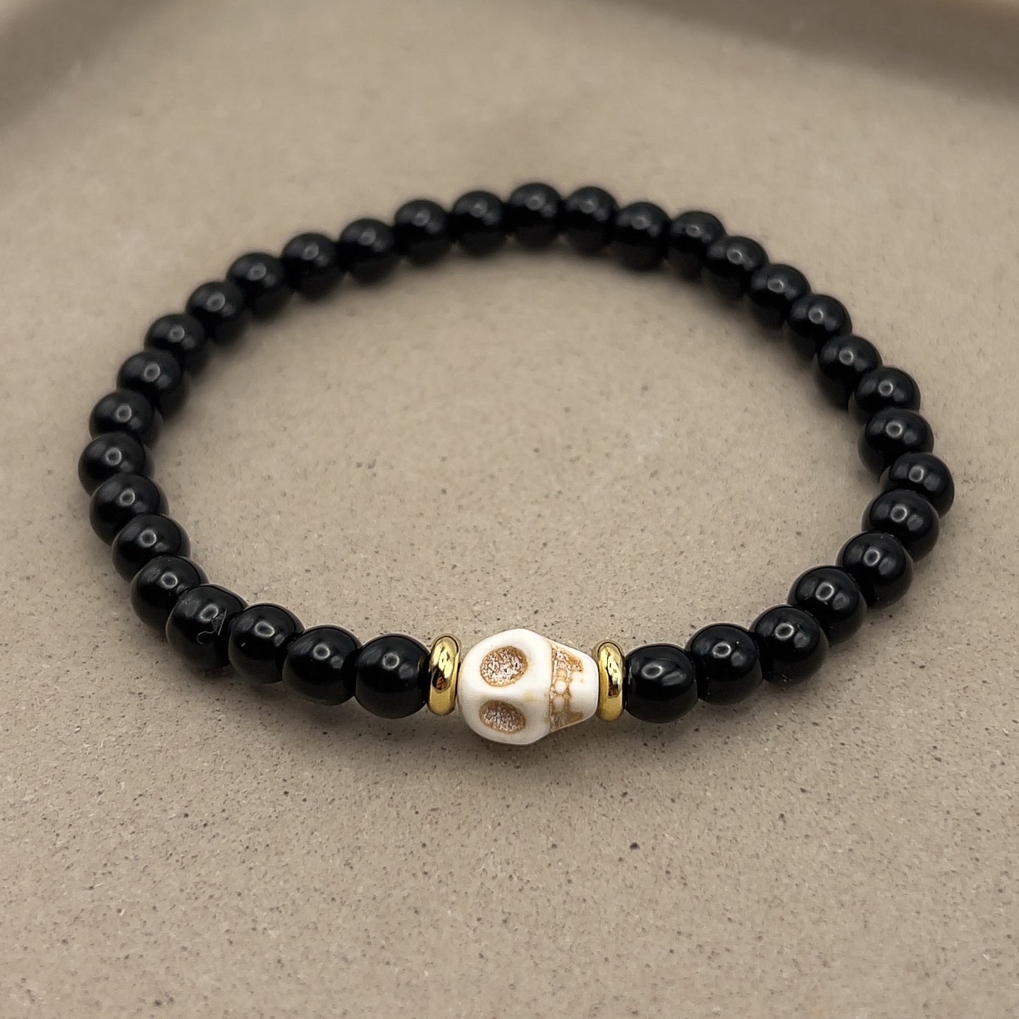 Black Beaded Ivory Skull Bracelet